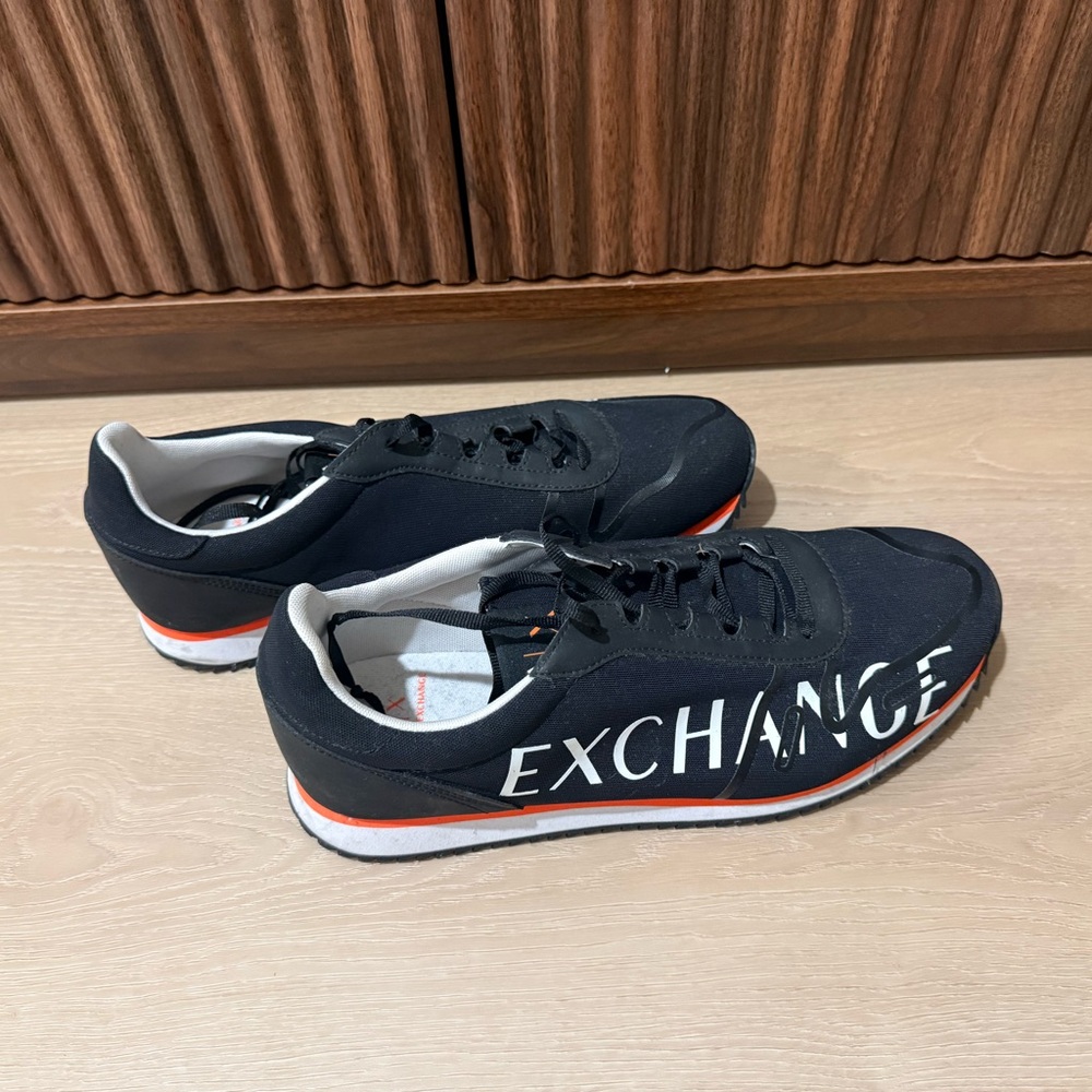 Armani Exchange Black Sneakers with White EXCHANGE Logo and Orange Trim